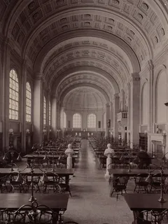Bates Hall interior with brown wooden chairs during 1895 McKim Building construction
