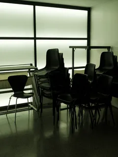 Modern room with chairs and table for meetings or dining