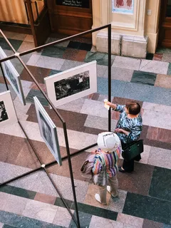 Two women viewing a photo together